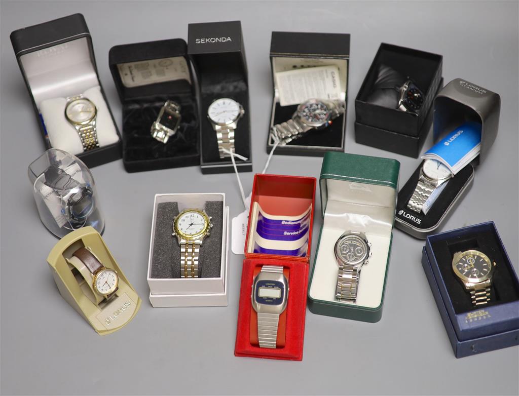 A collection of designer and other quartz wristwatches, including a Casio Wave Ceptor chronograph